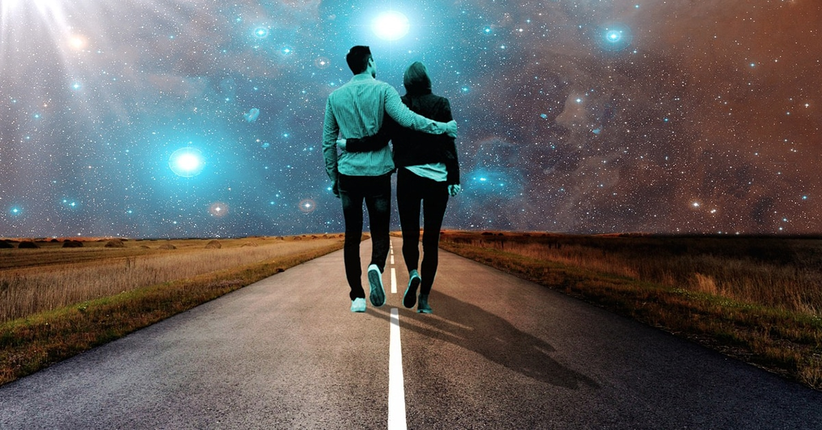 A couple connecting with a glowing pattern overlay.